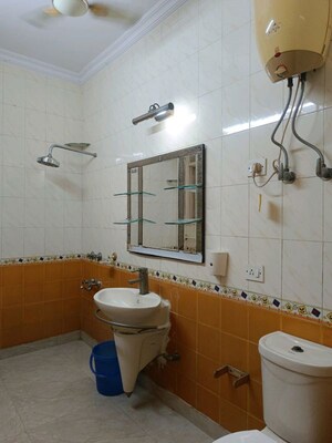Bathroom in 3 BHK Apartment at Vasant Kunj – for Rent