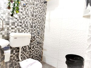 Bathroom in 1 BHK Apartment at Barnala Green Lotus Avenue, Ambala Highway – for Rent