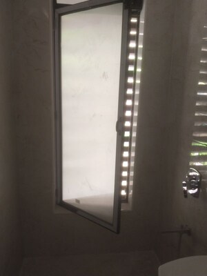 Bathroom in 2 BHK Apartment at Alliance Vista, Vile Parle East – for Sale