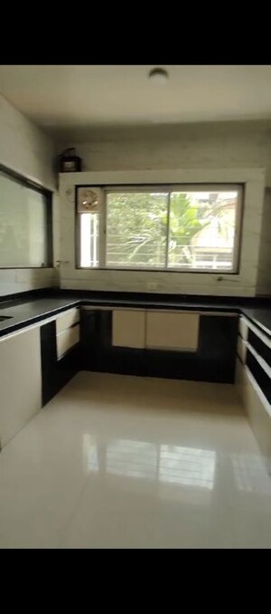 Kitchen in 4 BHK Apartment at New Era CHS, Gultekdi – for Sale
