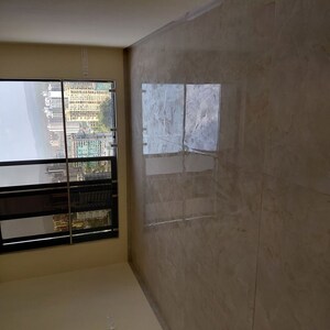 Room in 2 BHK Apartment at IM Applaud 38, Goregaon East – for Sale