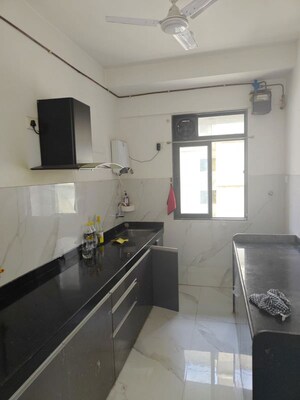 Kitchen in 2 BHK Apartment at Oshiwara – for Rent