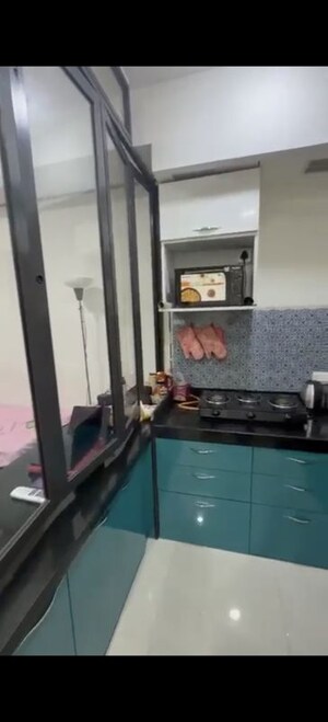 Kitchen in 1 RK Apartment at Lodha Crown Quality Homes, Majiwada – for Rent