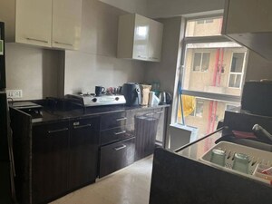 Kitchen in 2 BHK Apartment at Aalap CHS, Dadar East – for Rent