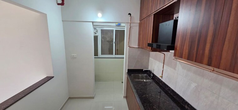 Kitchen, raheja-vistas-phase-1 2 Bedroom 1100 Sq.Ft. Apartment In Mohammadwadi Pune 10434641