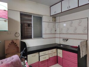 Kitchen in 1 BHK Apartment at Gangadham Apartment, Market Yard – for Rent