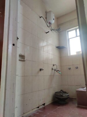 Bathroom in 1 BHK Apartment at Gangadham Apartment, Market Yard – for Rent
