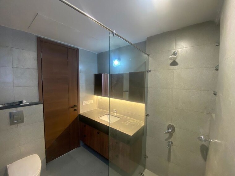 Bathroom, krisumi-waterfall-suites  2300 Sq.Ft. Apartment In Sector 36a Gurgaon 10434687