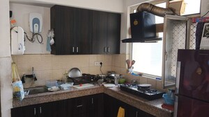 Kitchen in 2 BHK Apartment at Signature Orchard Avenue 2, Sector 93 – for Sale