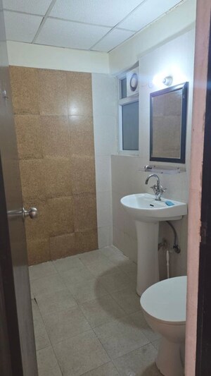 Bathroom in 2.5 BHK Apartment at Antriksh Golf View, Sector 78 – for Rent