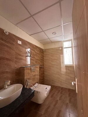 Bathroom in 3 BHK Apartment at Sikka Kimaantra Greens, Sector 79 – for Rent
