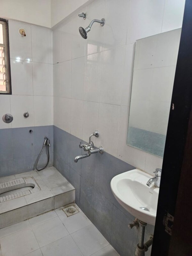 Bathroom, majestic-towers 2 Bedroom 950 Sq.Ft. Apartment In Katraj Pune 10434833