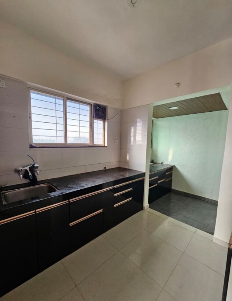 Kitchen, silver-homes 3.5 Bedroom 1055 Sq.Ft. Apartment In Moshi Pune 10434976