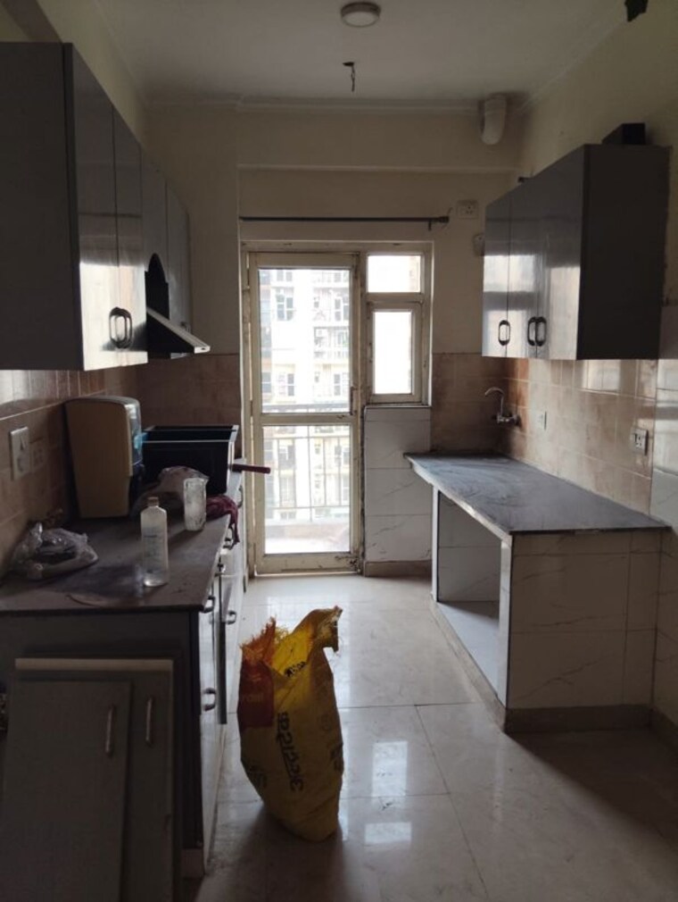 Kitchen, aims-golf-city 2 Bedroom 950 Sq.Ft. Apartment In Sector 75 Noida 10434975