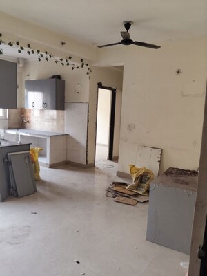 Living Room in 2 BHK Apartment at Aims Golf City, Sector 75 – for Rent