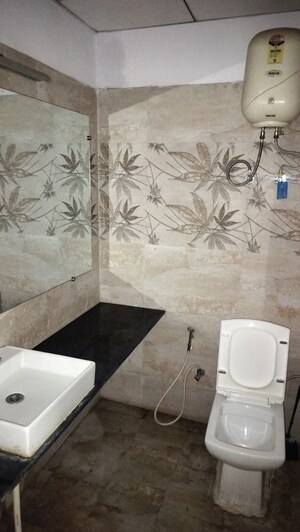 Bathroom in 1 RK Apartment at Paramount Golf Forest Studio Apartments - OAK Towe, Zeta I Greater Noida – for Rent