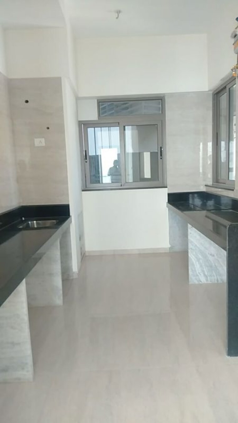 Kitchen, sheth-auris-serenity-tower-1 3 Bedroom 1233 Sq.Ft. Apartment In Malad West Mumbai 10435149