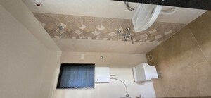 Bathroom in 1 BHK Apartment at Raj Tulsi Aawas, Badlapur East – for Rent