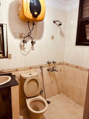 Bathroom in 2 BHK Apartment at Dwarka – for Rent