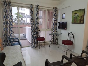 Living Room in 2 BHK Apartment at Kohinoor Tinsel County, Hinjewadi – for Rent