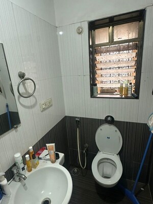 Bathroom in 2 BHK Apartment at Dedhia Palatial Height, Powai – for Rent