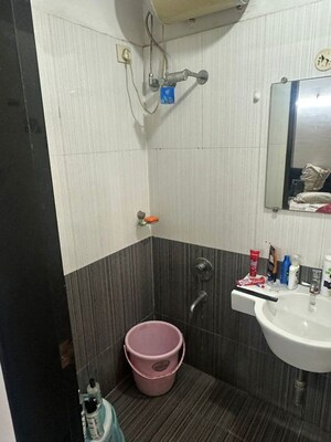 Bathroom in 2 BHK Apartment at Dedhia Palatial Height, Powai – for Rent