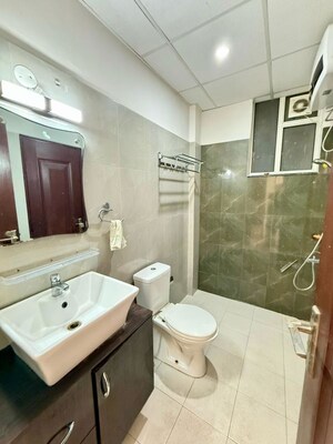Bathroom in 3 BHK Apartment at Sushma Crescent, Dhakoli – for Rent