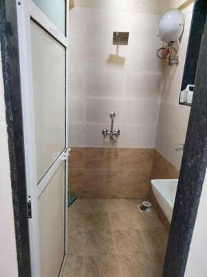 Bathroom in 1 BHK Apartment at Onkar CHS, Goregaon East – for Rent