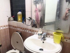 Bathroom in 2 BHK Apartment at Neelkanth Greens, Manpada – for Rent
