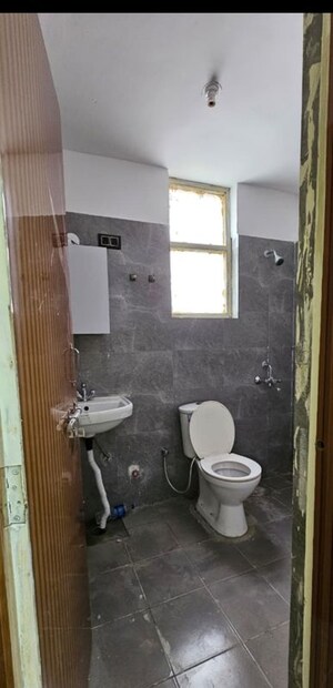 Bathroom in 3 BHK Apartment at Adore Happy Homes Pride, Sector 75 – for Sale