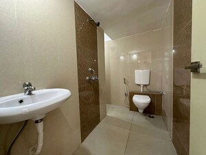 Bathroom in 3 BHK Apartment at Mohan Suburbia, Ambernath West – for Sale