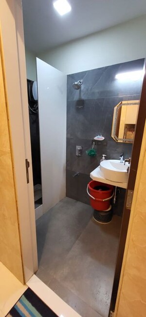 Bathroom in 1.5 BHK Apartment at Deraiya Iconico, Kurla East – for Sale