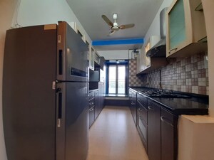Kitchen in 2 BHK Apartment at Dheeraj Valley, Goregaon East – for Rent