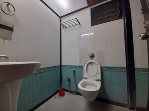 Bathroom in 2 BHK Apartment at Dheeraj Valley, Goregaon East – for Rent