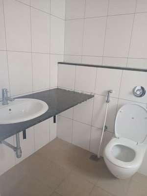 Bathroom in 2 BHK Apartment at Godrej Aqua, International Airport Road – for Rent