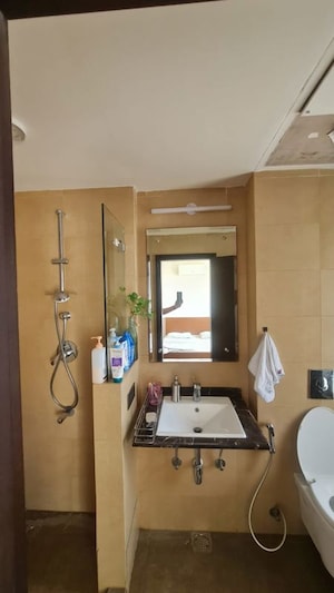 Bathroom in 4 BHK Apartment at Mahindra Luminare, Sector 59 – for Sale