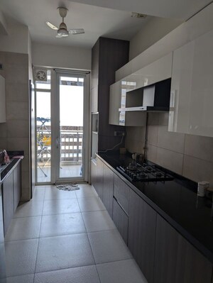 Kitchen in 3 BHK Apartment at Mahindra Luminare, Sector 59 – for Rent