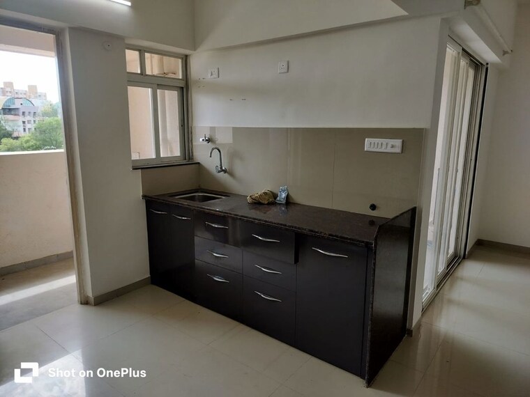 Kitchen, sr-the-fountainhead 2 Bedroom 1000 Sq.Ft. Apartment In Balewadi Pune 10435830