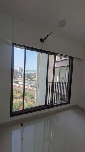 Room in 2 BHK Apartment at Sunteck City Avenue 4, Goregaon West – for Sale