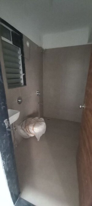Bathroom in 1 BHK Apartment at Shree Madhuban CHS, Goregaon East – for Rent