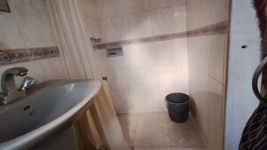 Bathroom in 1 BHK Apartment at Aalap CHS, Dadar East – for Rent