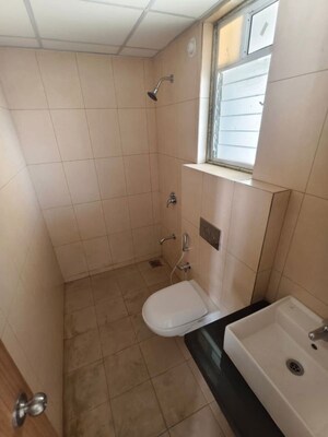 Bathroom in 2 BHK Apartment at Godrej Emerald, Ghodbunder Road – for Rent