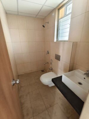 Bathroom in 2 BHK Apartment at Godrej Emerald, Ghodbunder Road – for Rent