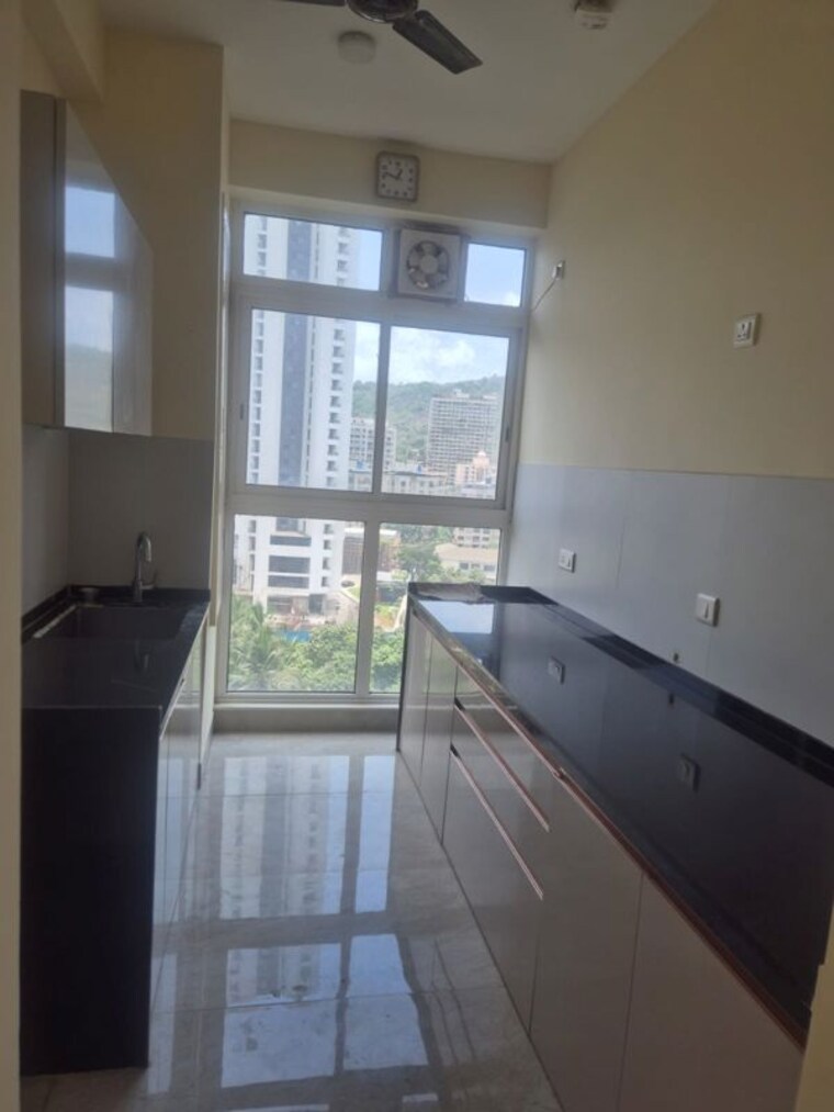 Kitchen, tata-serein 2 Bedroom 900 Sq.Ft. Apartment In Pokhran Road No Two Thane 10436237