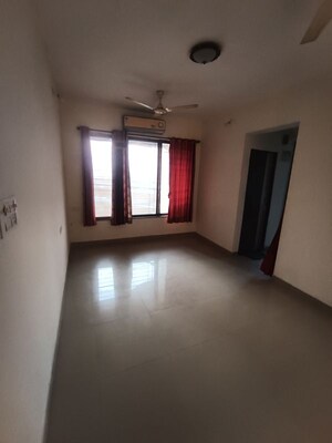 Living Room in 1 BHK Apartment at Ajmera Yogi Dham Phase III, Kalyan West – for Sale