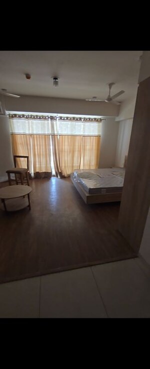 Living Room in Studio Apartment at Godrej Golf Links Evoke, Sector 27 Yamuna Expressway – for Rent