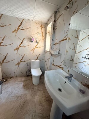 Bathroom in 3 BHK Apartment at Gaur Atulyam Gravity, Omicron I Greater Noida – for Rent