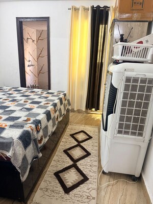 Bedroom in 3 BHK Apartment at Gaur Atulyam Gravity, Omicron I Greater Noida – for Rent