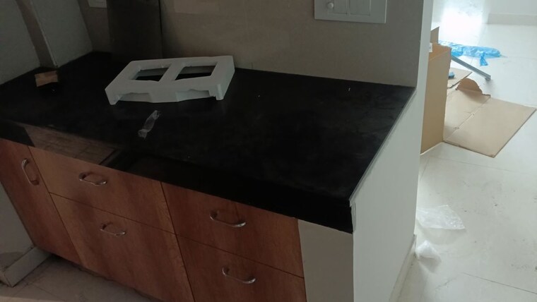 Kitchen, eldeco-live-by-the-greens 2 Bedroom 1137 Sq.Ft. Apartment In Sector 150 Noida 10436472