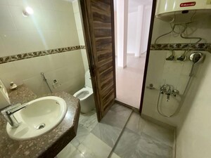Bathroom in 3 BHK Builder Floor at Panchsheel Enclave – for Rent